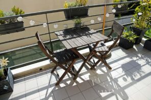 4 Tips For Choosing The Right Balcony Furniture. Great black wooden furniture set with the table and foldable chairs for open balcony