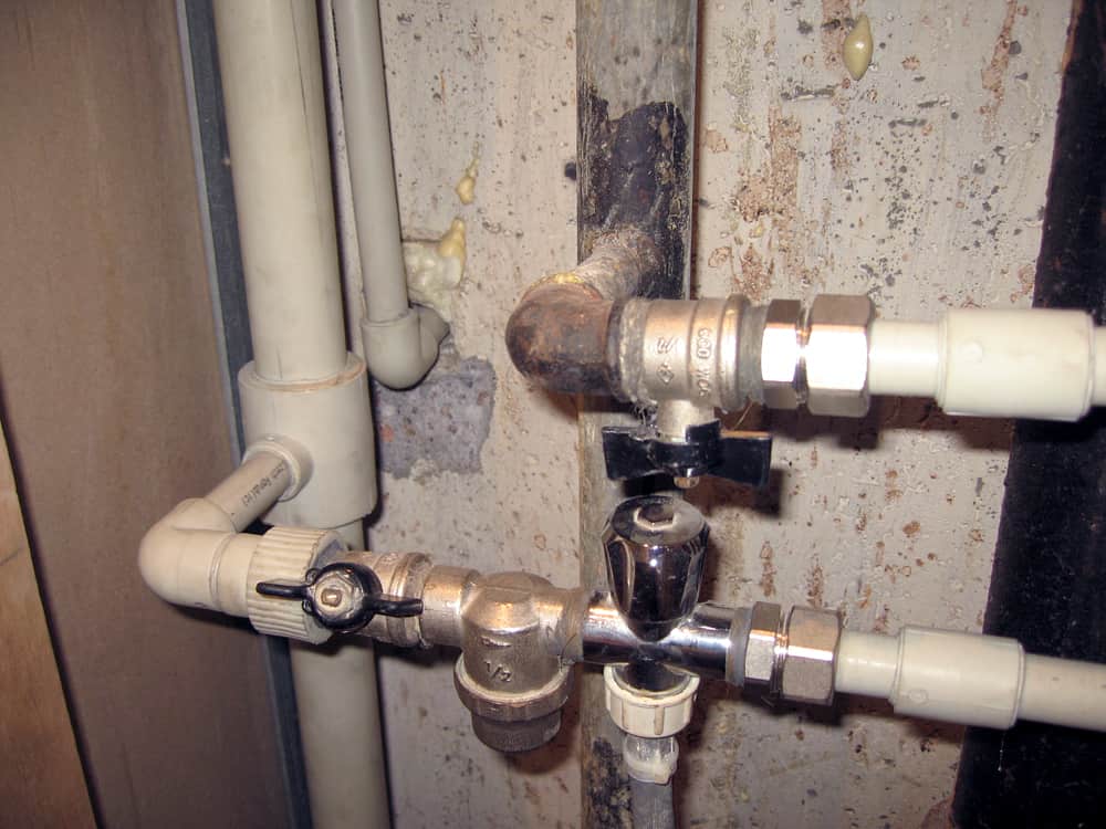 The Most Common Plumbing Problems with Older Homes. Different materials of older and newer pipes with adapters