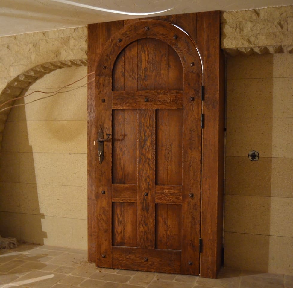 Finding the Perfect Oak Doors for Your Home. Massive carved door for the ground level