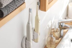The Top 10 Gadgets and Gizmos Every Bathroom Needs. Electric toothbrush in the modern interior
