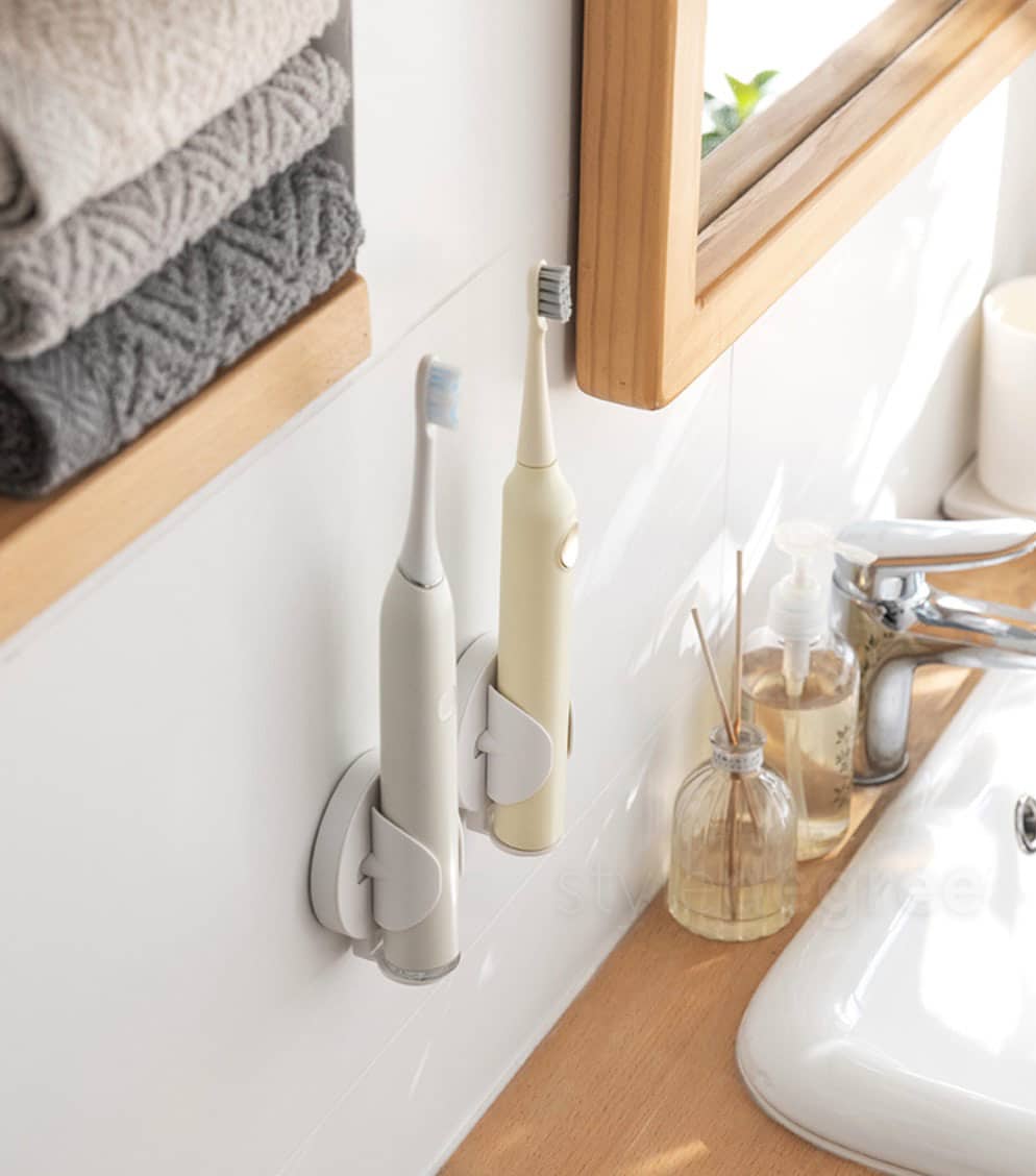 The Top 10 Gadgets and Gizmos Every Bathroom Needs. Electric toothbrush in the modern interior