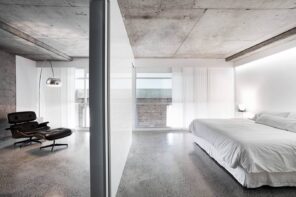 Reasons Why Concrete is the Best Flooring Alternative to Your Homes. Great minimalistic interior with shining polished concrete floor and large bed