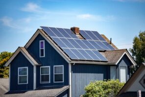 5 Errors with Solar Installations and How to Avoid Them. Blue sided house with solar panels on the roof