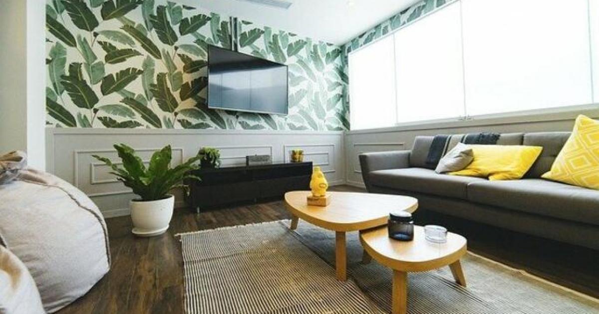 How To Upgrade Your Home Decor And Furniture While On A Budget. Colorful ecodesign wallpaper, two-tier coffee table for casual designed living room