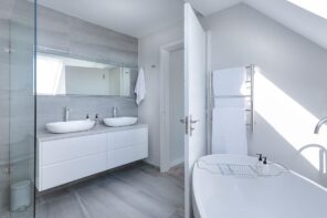Bathroom Design Trends To Consider When Renovating Your House. Light pastel color scheme for contemporary space with laminated floor