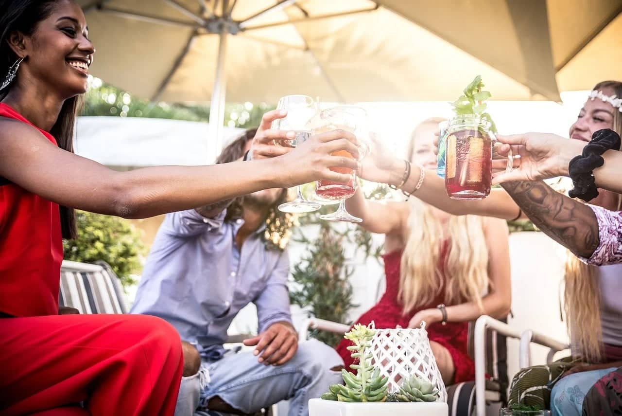 Design Ideas for Your Next Event Your Attendees Won't Soon Forget. Drinking the beverages in the company under the parasol