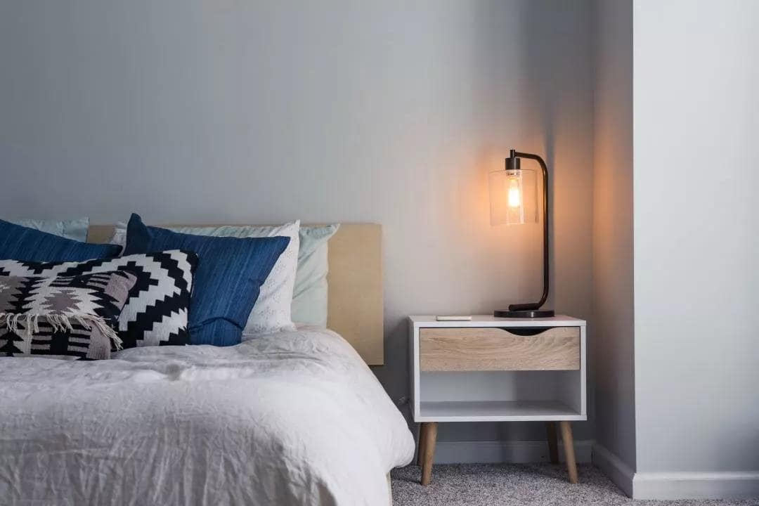 How To Choose The Right Furniture For Your New Home. White bedroom with Scandi minimalistic furniture and matte finished walls
