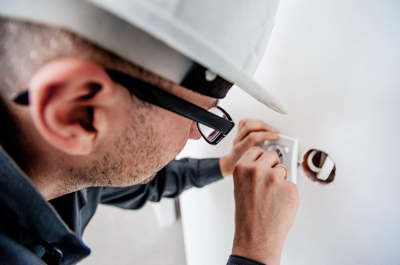 Hire The Right Electrician With These Useful Tips. Installation of the socket by a professional
