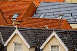 Important Steps to Take Before Installing A New Roof. Ceramic shingles of the roofs in the old European city center