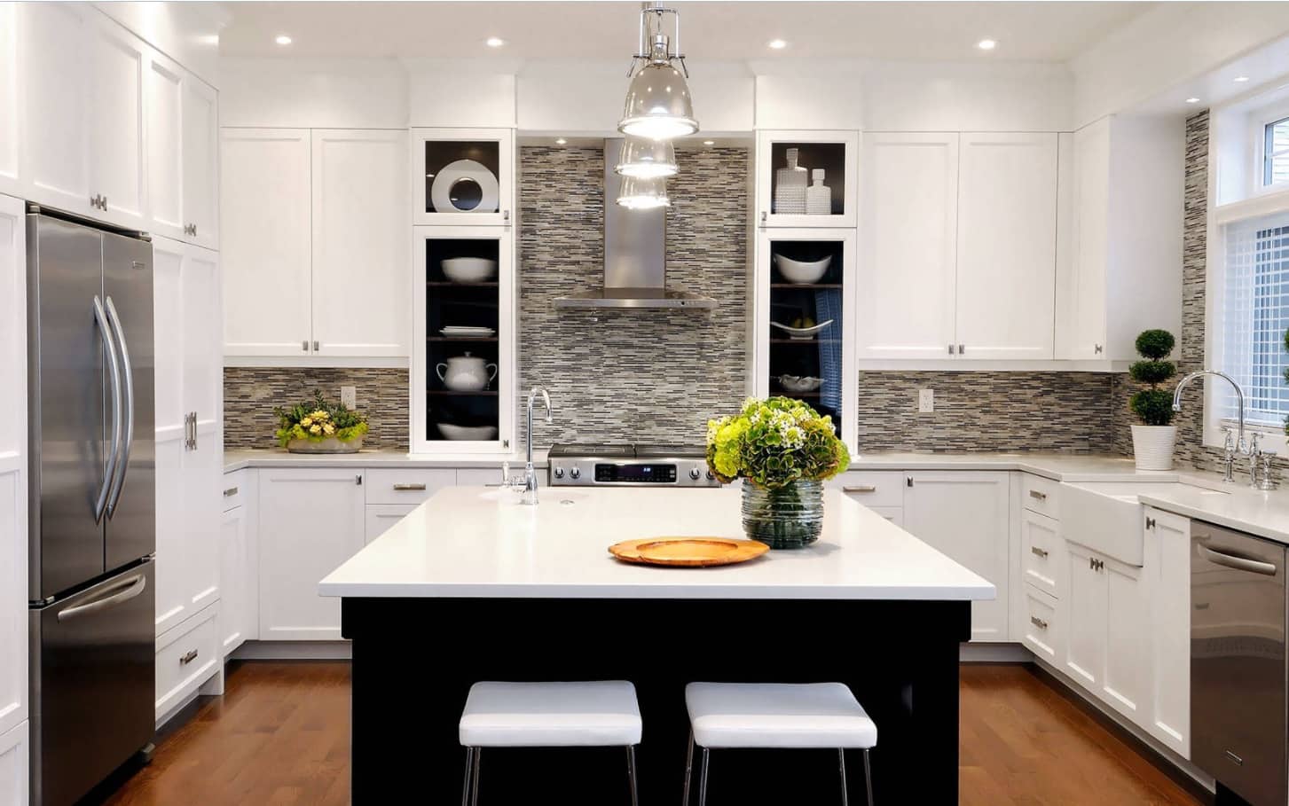 How Mosaic Tile Backsplash Adds Value To Our Kitchen Interiors. Black and white contrast for contemporary kitchen with masterful lighting and gray mosaic