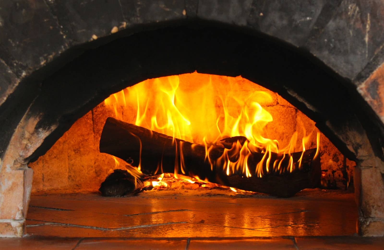 Helpful Tips for Buying a New Furnace. Logs burning into the furnace