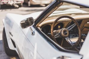 Do You Collect Cars? Here Are 6 Things You Absolutely Need. Classic muscle car with leather steering wheel wrap