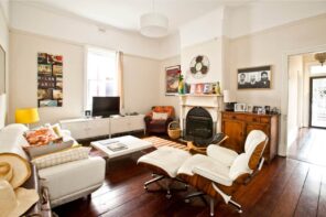 2 DIY Jobs You Can Do and 3 You Should Leave to the Experts. Casual living room with Eames chair and white calming interior