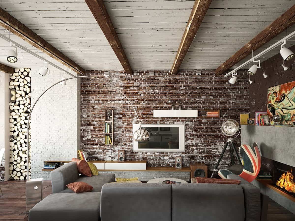 Whitewashed brick wall and rough treated ceiling with exposed beams for loft living with large floor lamp and the gray sofa 