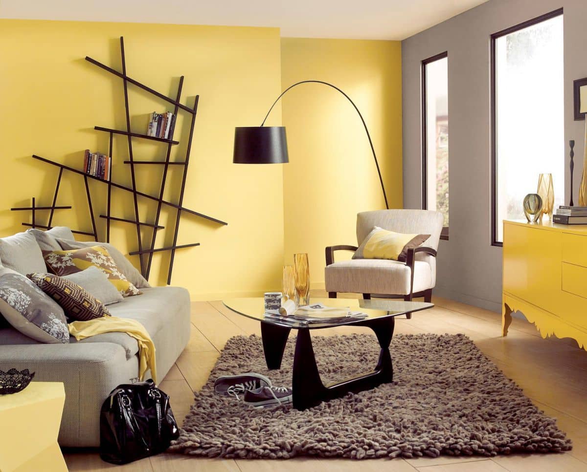 Bright Yellow Living Room Interior Decoration and Design Ideas. Nice black shelving and the floor lamp - dark accents for yellow painted area