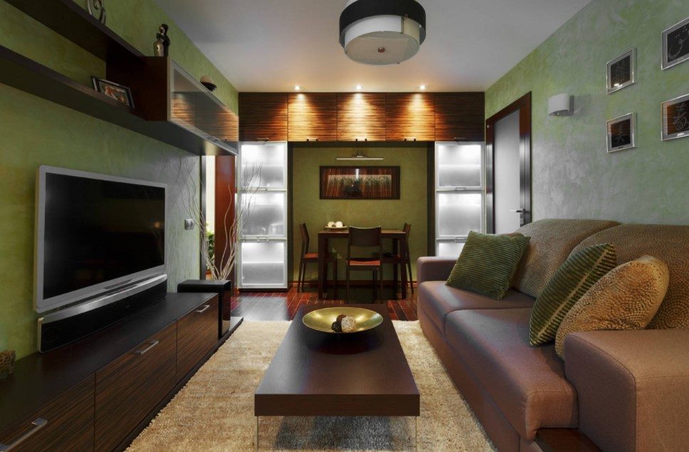 Living Room Interior 2022: Fashionable Design Trends & Ideas. Green and brown color stylistic of the living room