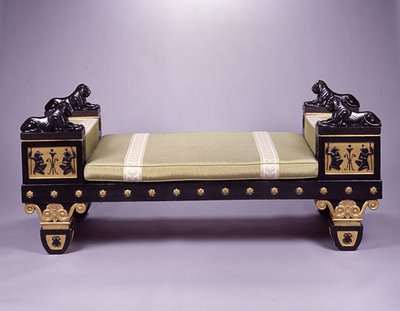 Egyptian Interion Design Style. Quilted bench on castors in "firm" gilded and black tones