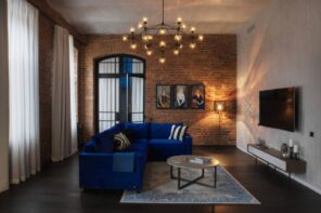 Brickwork in the modern loft living room with starburst chandelier