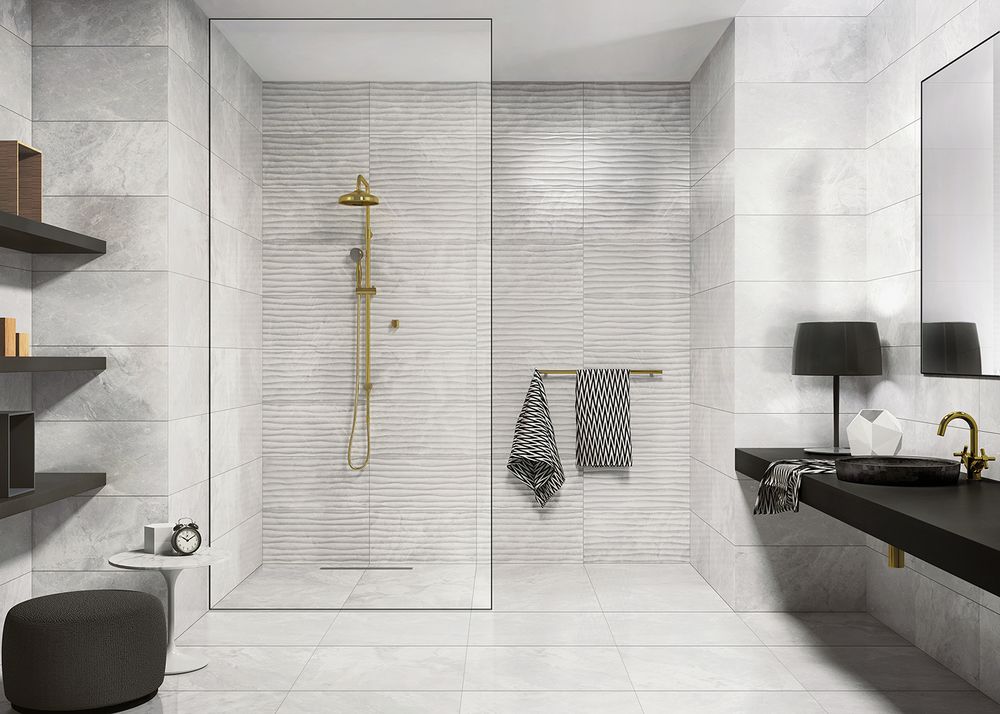 Absolute minimalism and gilded shower with glass screen