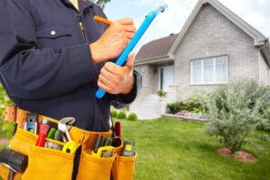 5 Easy Tips For DIY Home Plumbing Inspection. The plumber making notes at the tablet