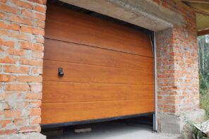 Should You Repair Or Replace Your Old Overhead Door? Brickwork surrounded door arch for wooden lifting construction