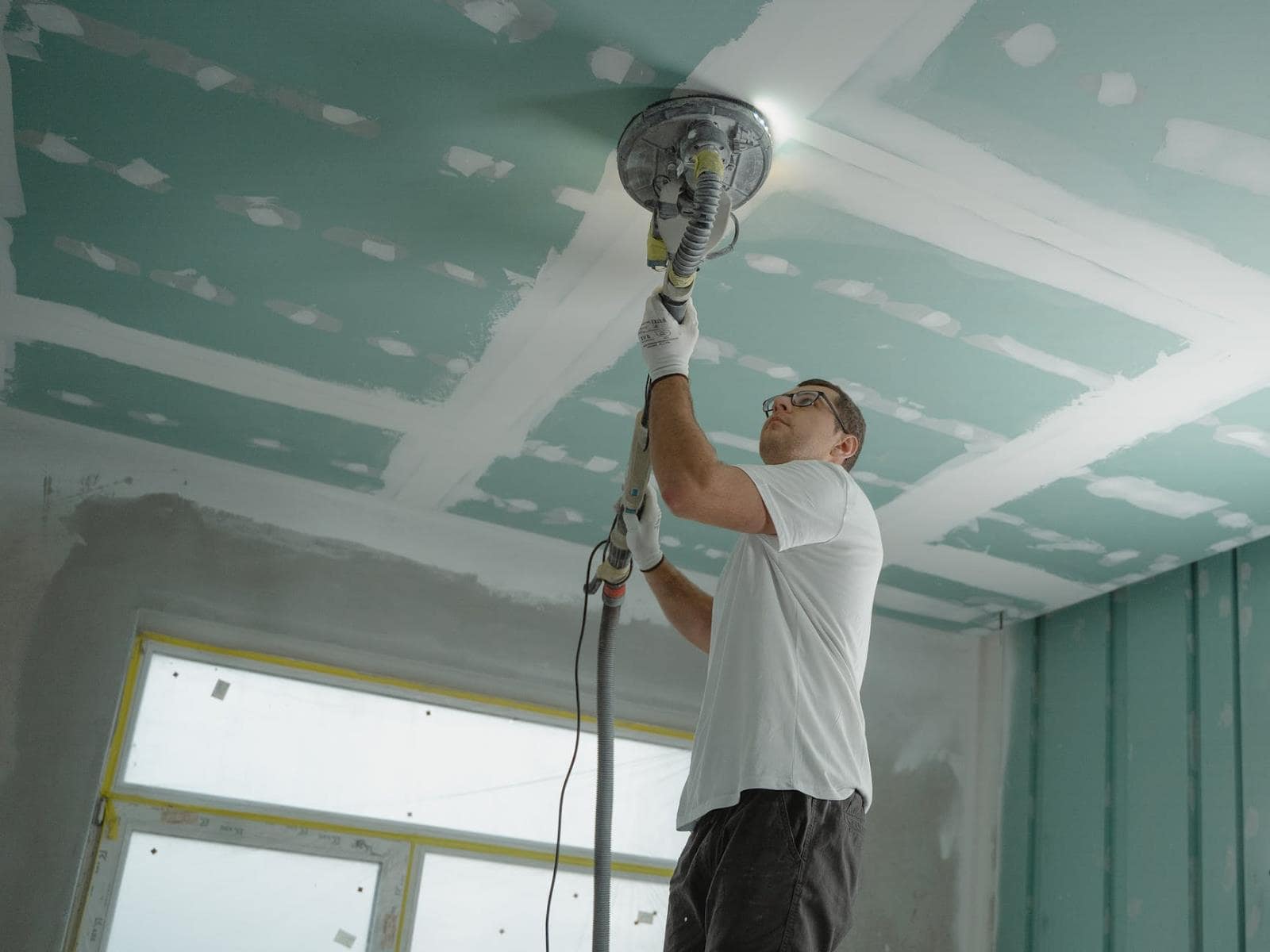 6 Ways To Upgrade Your Home. Grinding the plasterboard ceiling
