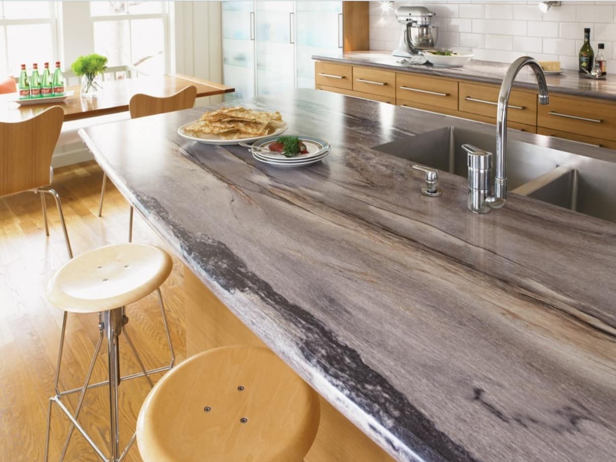 How Long Do Laminate Countertops Last. Contemporary kitchen with gray streaks countertop and round bar stools