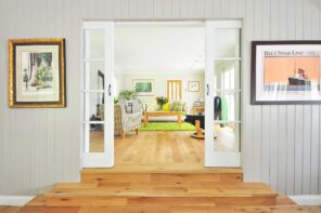 Expert Tips to Make Your Home More Accessible. Two steps for the living room with sliding door and wooden floor