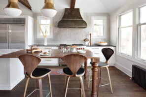 How To Design An Eclectic Kitchen For Your Next Remodel. White interior with dark wooden chairs and extractor hood