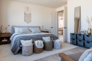 5 Easy Decluttering Hacks For Your New Home. Contemporary bedroom with wall decoration and boxes for things