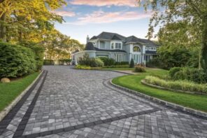 Why You Should Use Concrete Pavers in Your Landscape. Great American style house with paved territory
