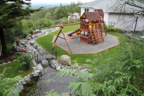 3 Tips for Turning an Outdoor Space into a Children's Play Area. The wooden castle for kids at the backyard