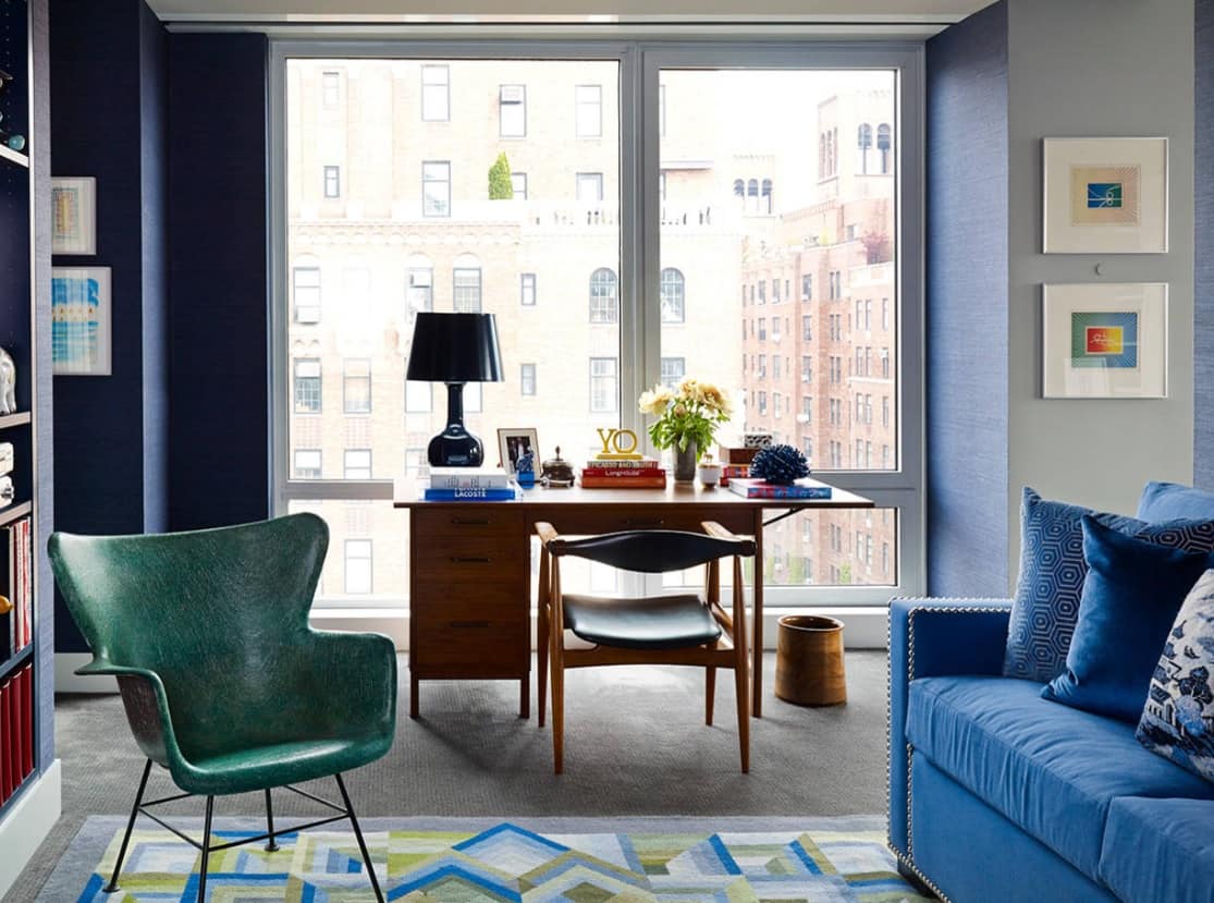 5 Essential Features of a Home Office. Mid-century styled home office at the skyscaper with panoramic view and calming blue and greeen color palette