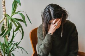 5 Mistakes When Going Solar – and How to Avoid Them. Worried young woman covering face with hand