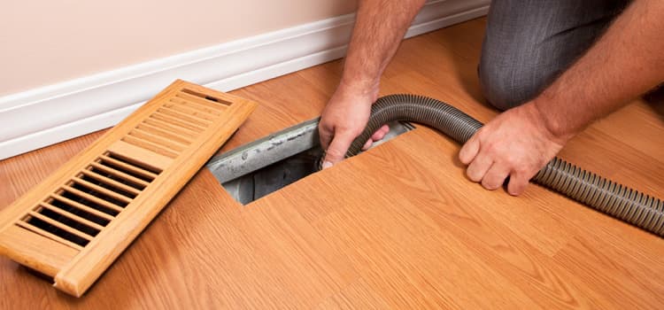 6 Ways Air Duct Cleaning Can Improve Your Air Quality. Vacuum cleaning the AC located under the floor