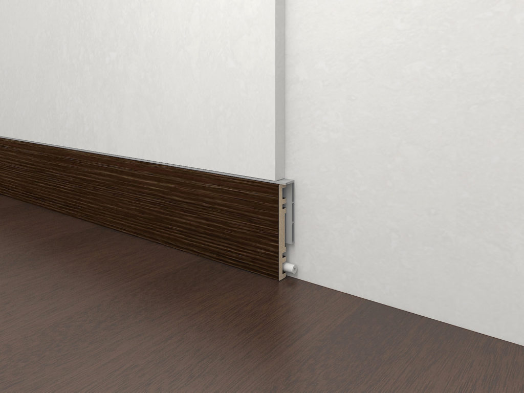 Tips on How to Fix Skirting Boards in Your Home. Modern wooden skirting board with the hollows inside for wiring