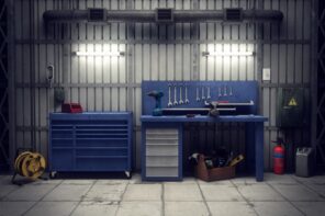 The Brief Guide That Makes Organizing Your Garage Simple. Metal sheathed walls and blue workbench table with tools