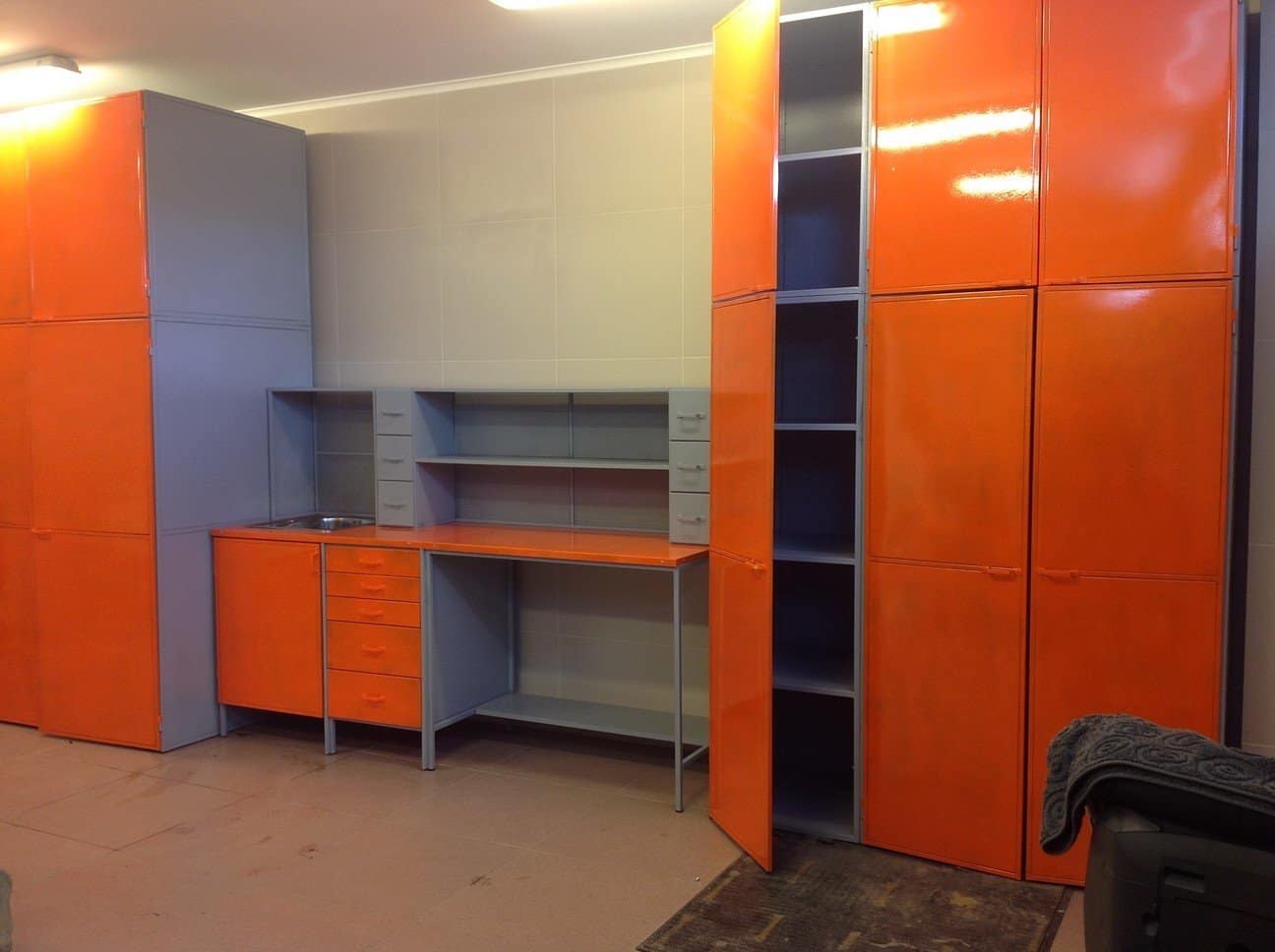 The Brief Guide That Makes Organizing Your Garage Simple. Joyful orange closed cabinet