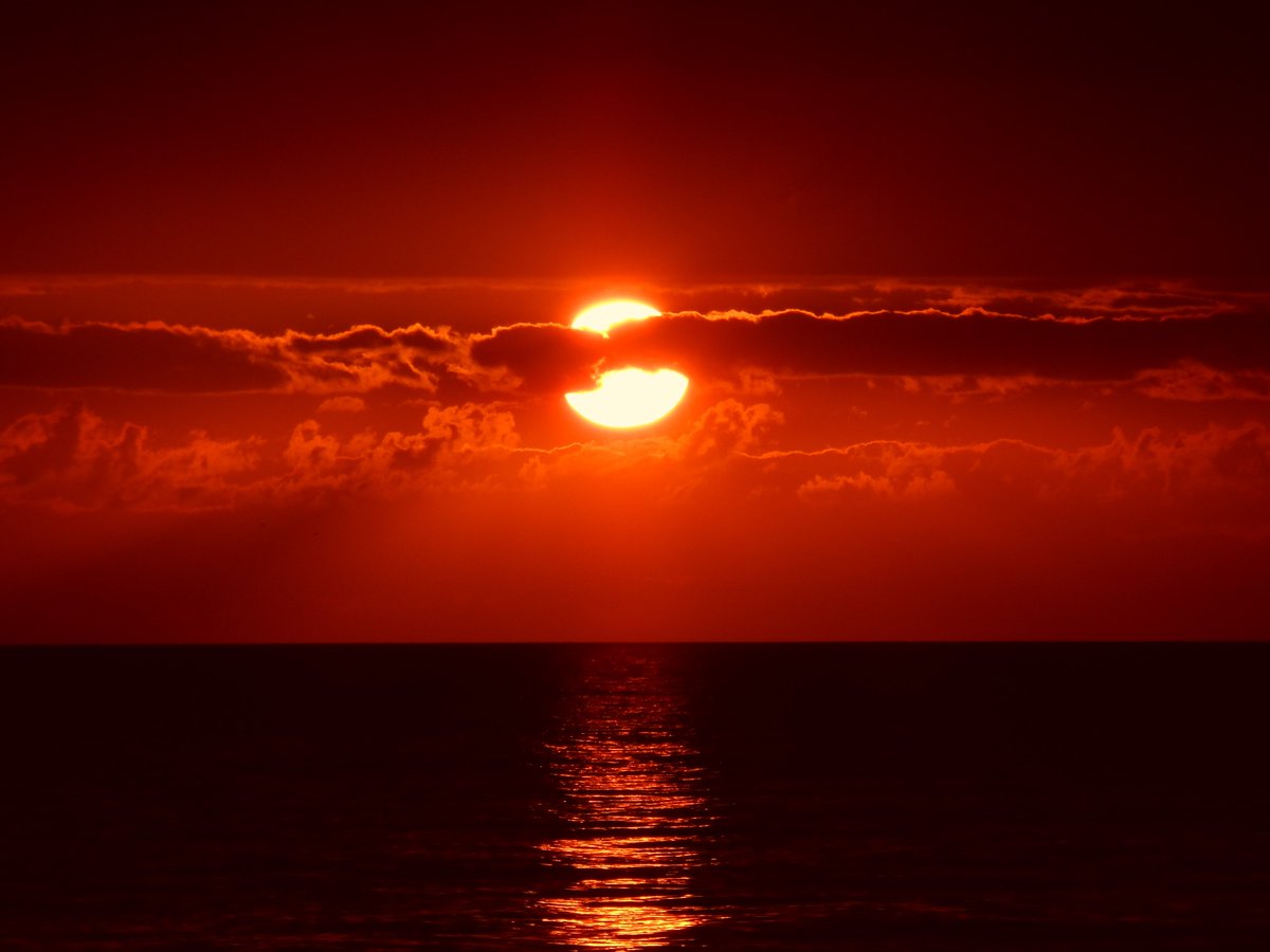 Ways to Stay Cool in Your Apartment During the Summer Months. Scorching sunset in the sea 