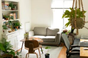 6 Fun Ideas to Implement if You Love Industrial Design. Light color scheme for Hygge minimalistic interior of the living with small round table, wooden chair and gray sofa