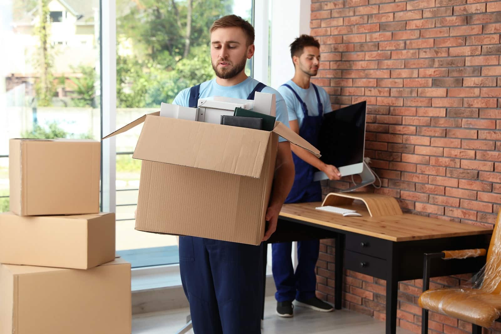 7 Steps To Take Before Renting Out Your Property. Moving service workers arranging the new place