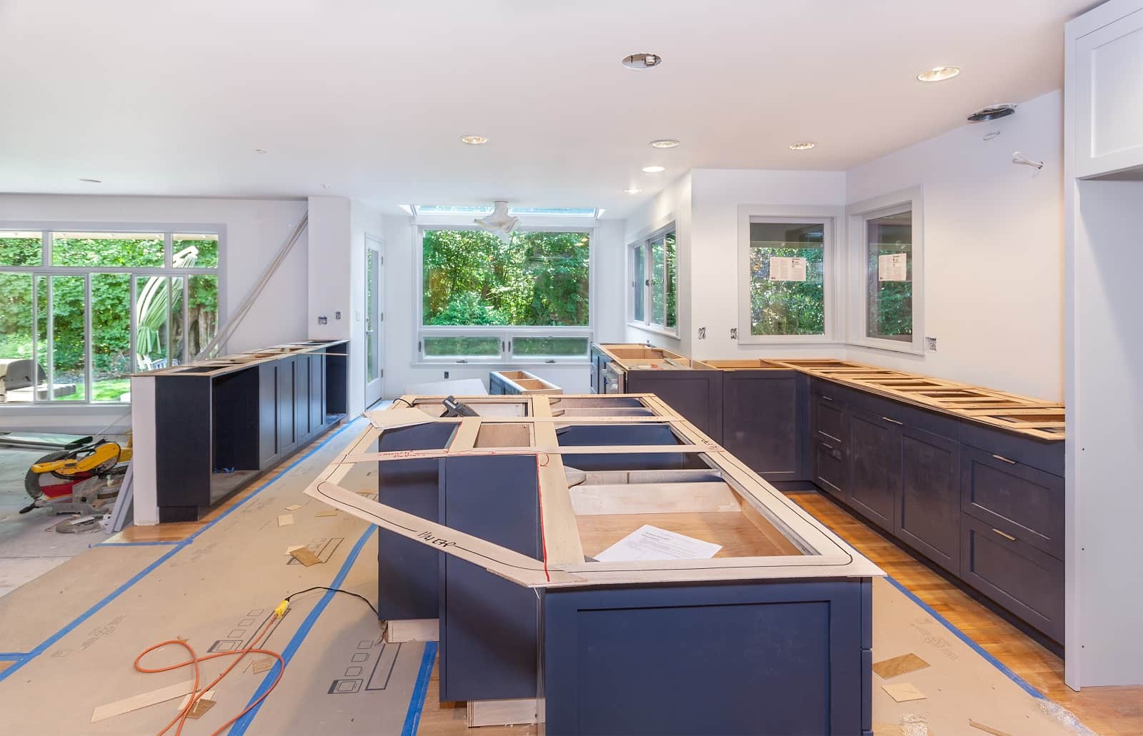 The Dos And Don'ts Of A Perfect Kitchen Remodel. A great contemporary designed space with large central island before installing the countertop