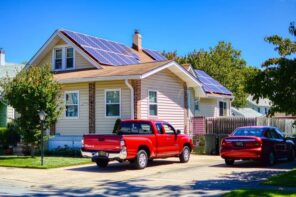 5 Advances in Roofing Technology That Could Save Homeowners Money. Solar panels at the top of casual American style finished house with gable roof