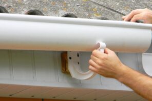 Identify 4 Common Issues in Poor Rain Gutter Installation. Fixing the gutter with the bracket