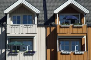 Party Wall Agreements for Loft Conversions: A Detailed Guide. Different colors of the balconies between two parts of one multi-story building