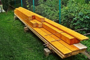 The Complete Guide to Wood Protection Solutions. Wood logs and planks in the garden