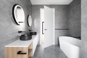 How To Make A Bathroom More Easily Accessible. Chic faux concrete wall and floor with round forms of the furniture and other interior elements