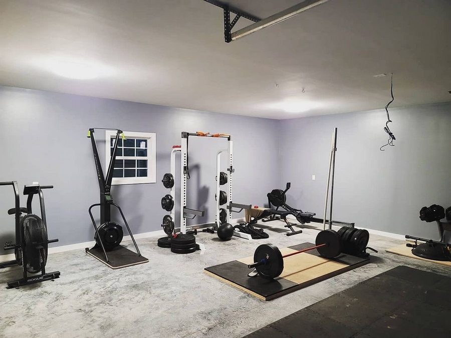 How to Transform your Basement Into a Home Gym this Winter. Highly functional gym with proper lighting and all the necessary equipment for all muscle groups