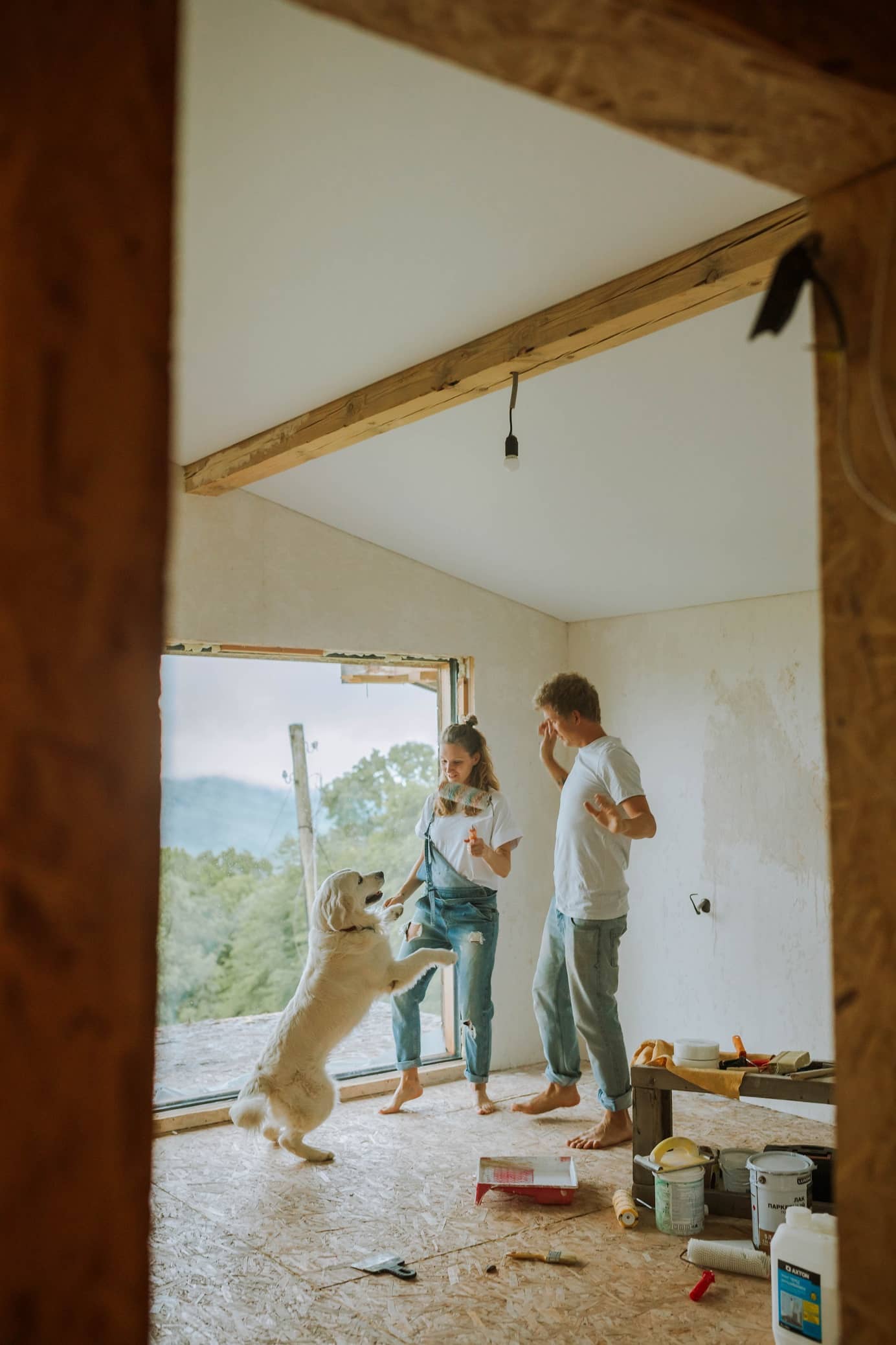 Say Goodbye to That Awkward Family Room Set-Up with a Corner TV Stand. The remodeling from scratch in the living room with the exposed ceiling beam