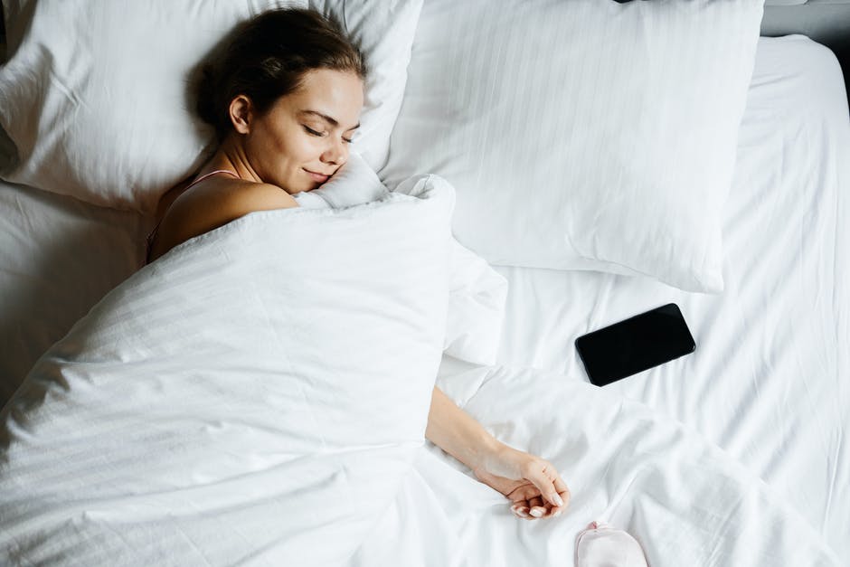 The Benefits of a Murphy Bed. The woman sleeping in the bed